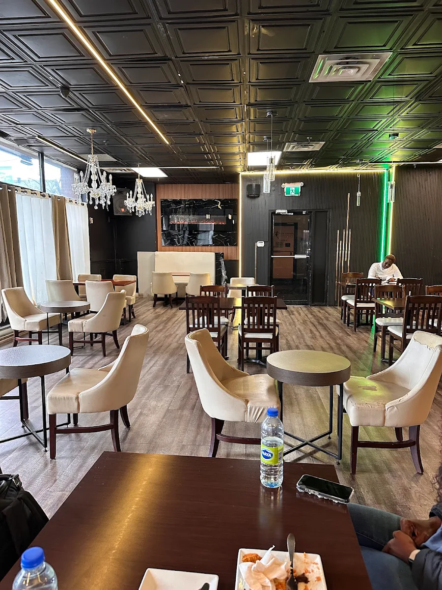 Vibe, Suya Palace Nigerian/African Charcoal Grill & BBQ Restaurant