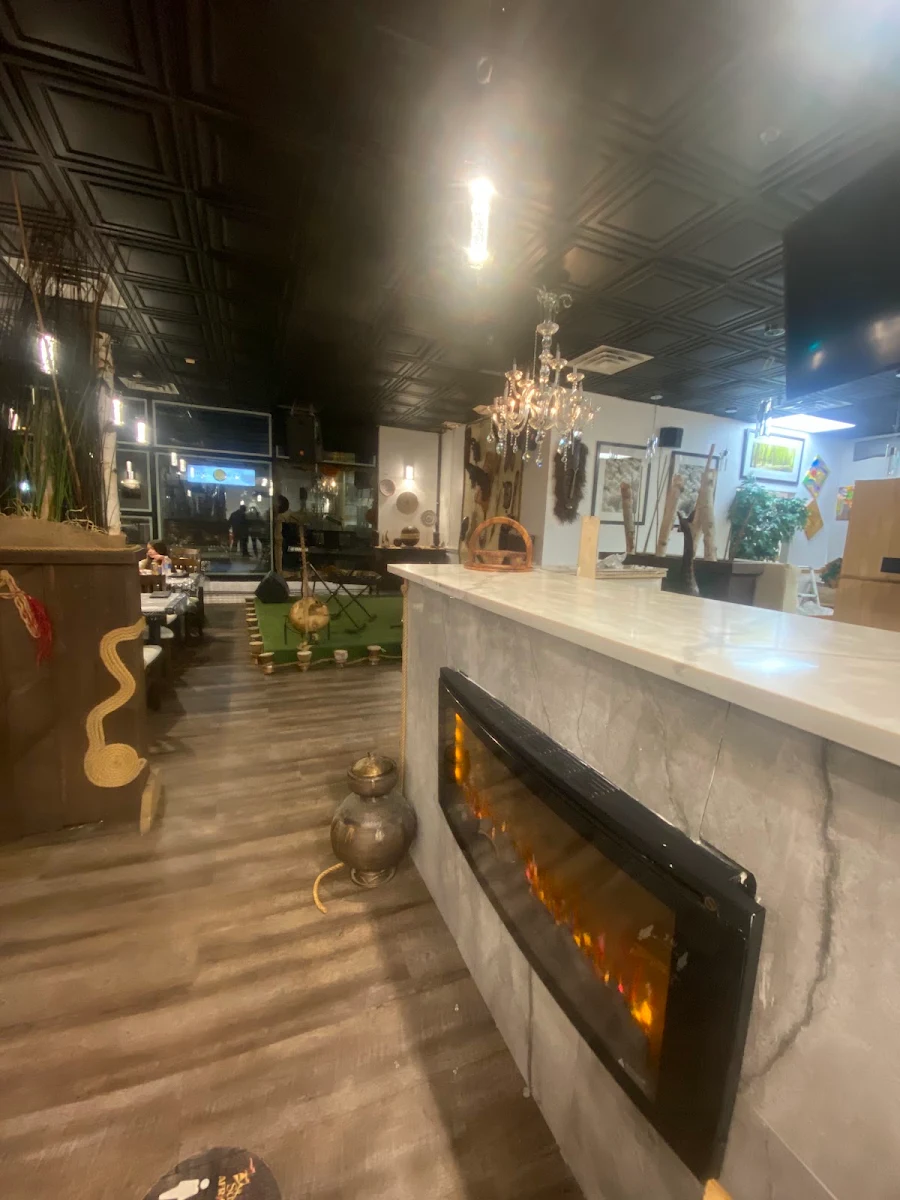 Vibe, Suya Palace Nigerian/African Charcoal Grill & BBQ Restaurant