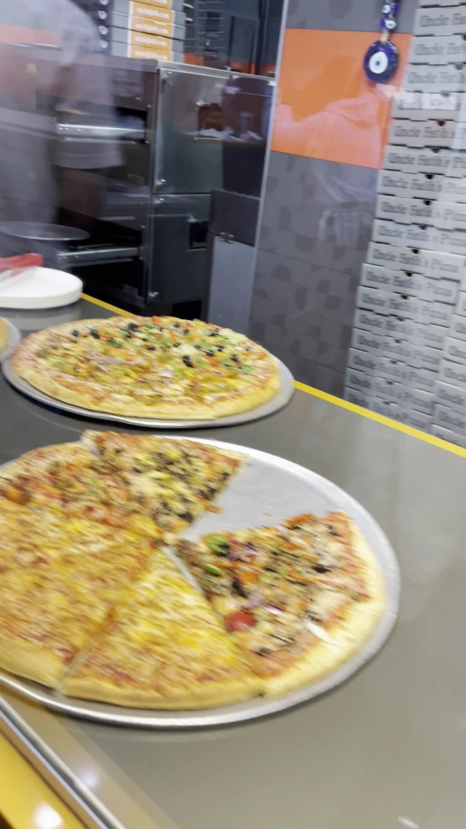 Menu, Uncle Fatih's Pizza - CAMBIE