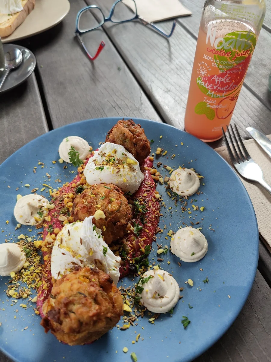 Zucchini and Haloumi Fritters with Poached Eggs, Café Woodworks