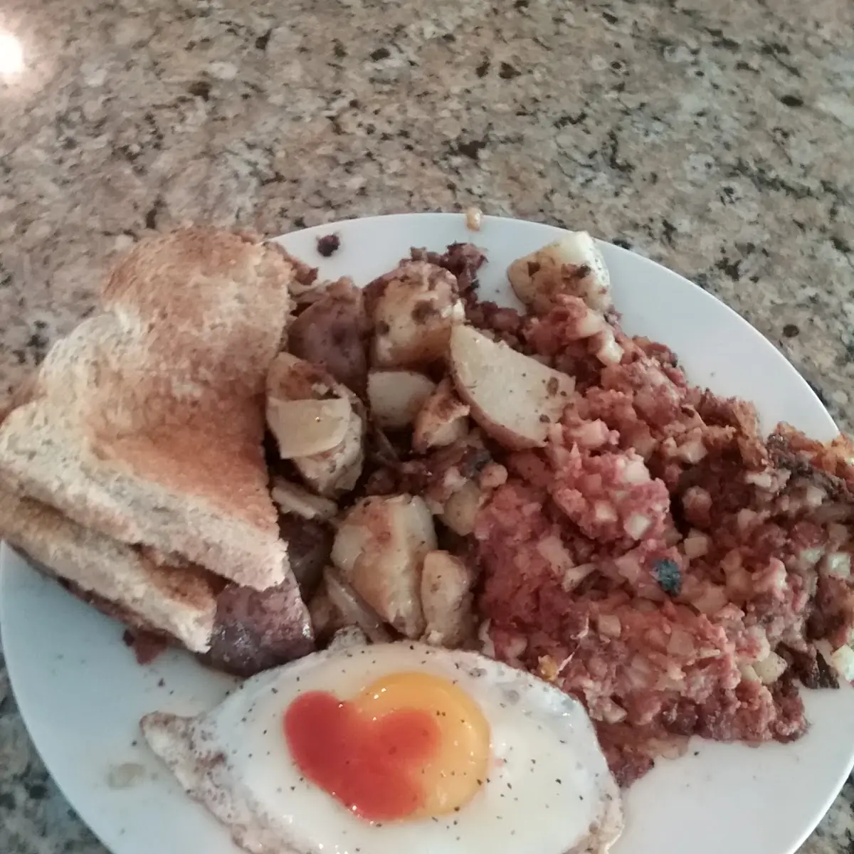 One Egg with Corned Beef Hash and Home Fries