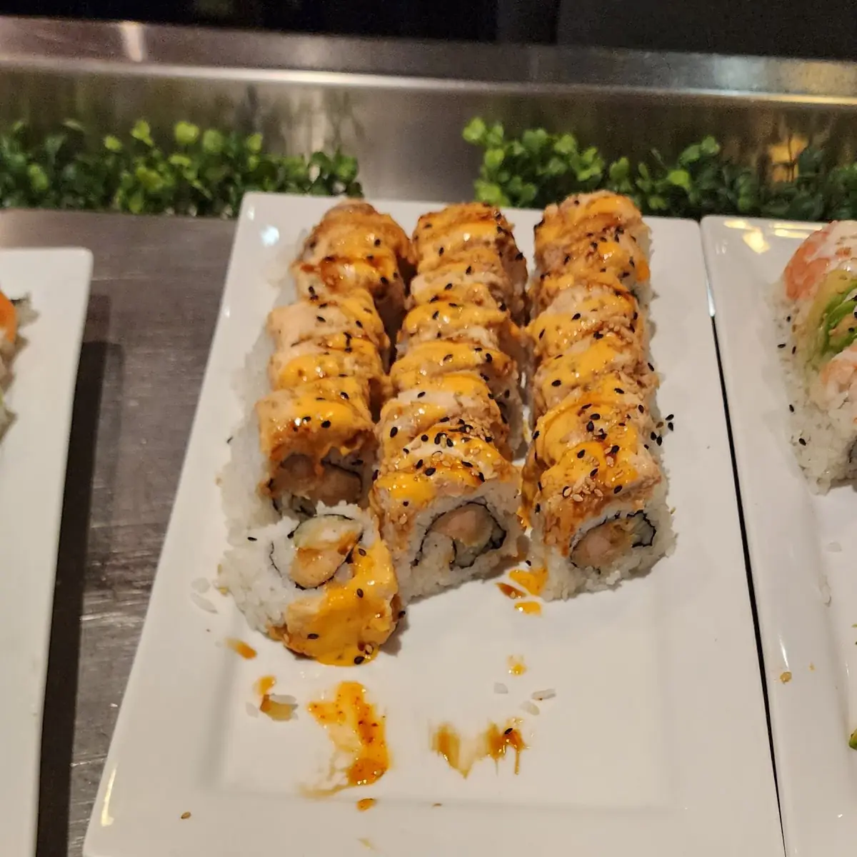 Masago Hand Roll and Salmon Sushi