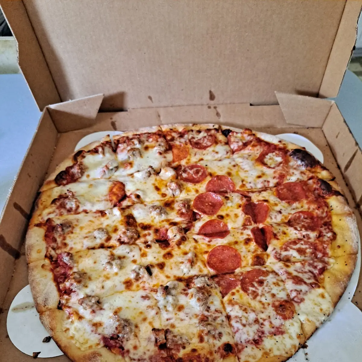 Large Cheese Pizza Half Sausage Half Pepperoni