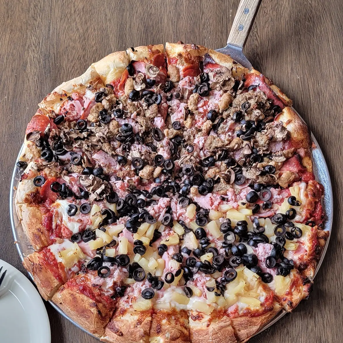 Half Meat Half Hawaiian Pizza