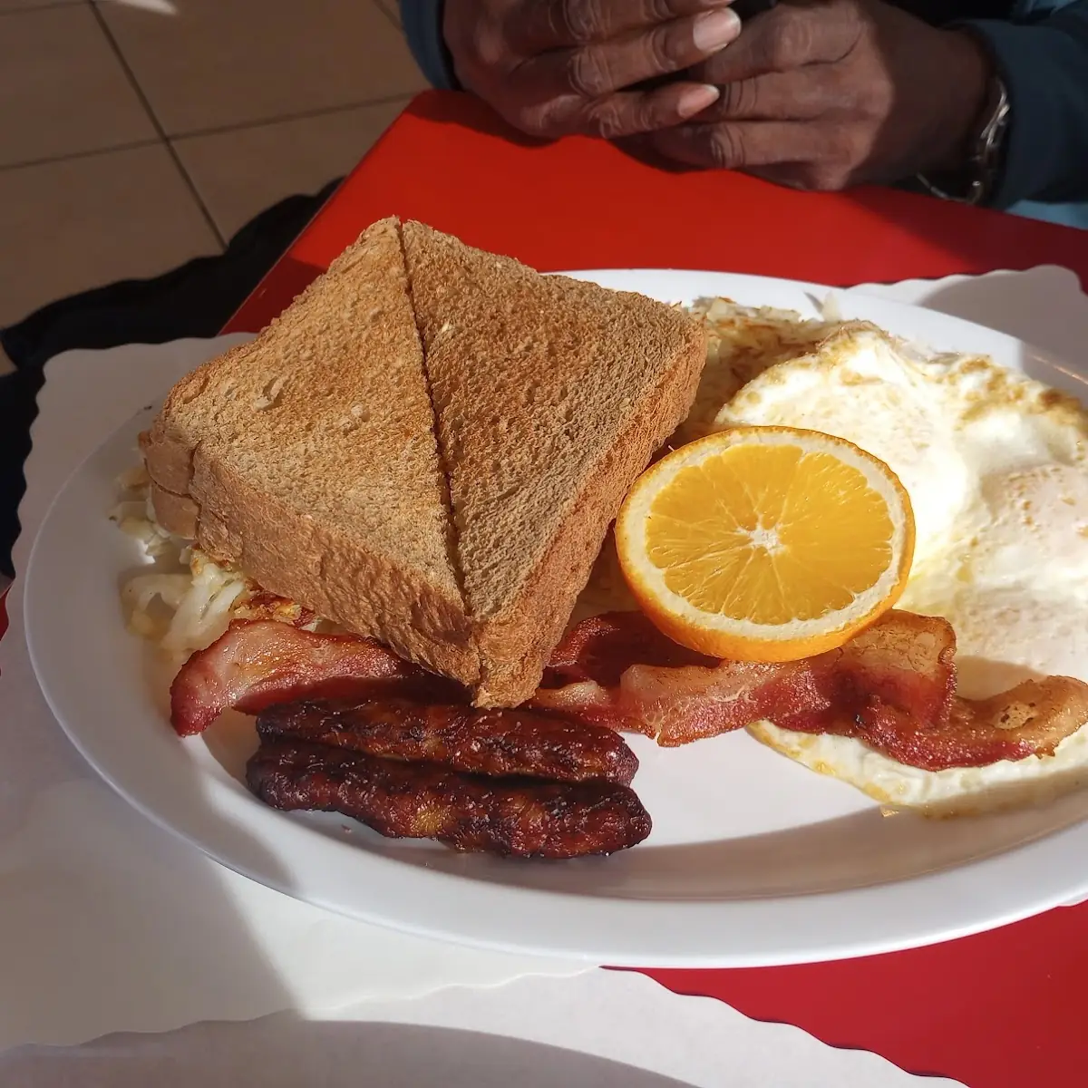 Eggs Hash Browns Bacon Sausage and Toast