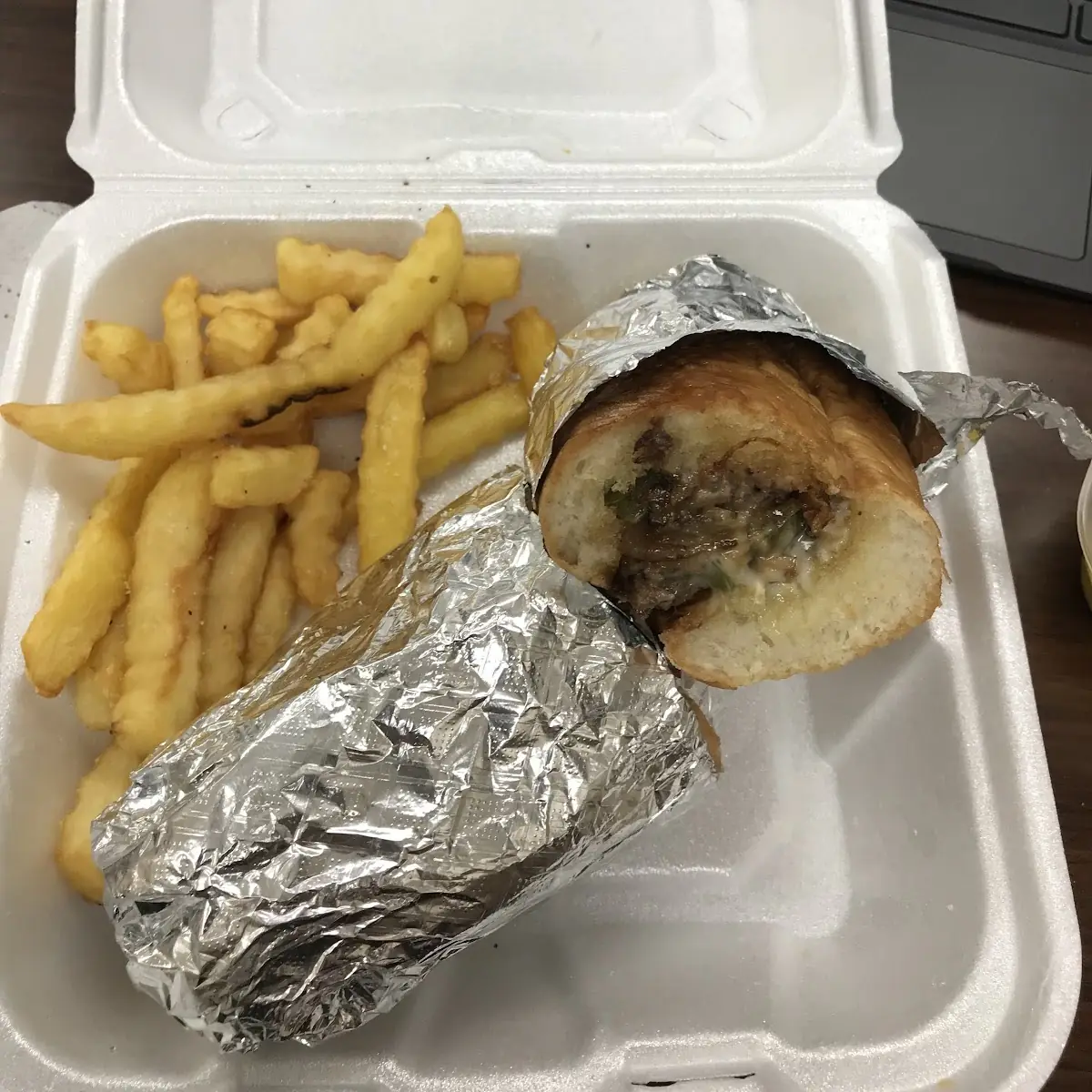 Philly Cheesesteak Sandwich with Fries