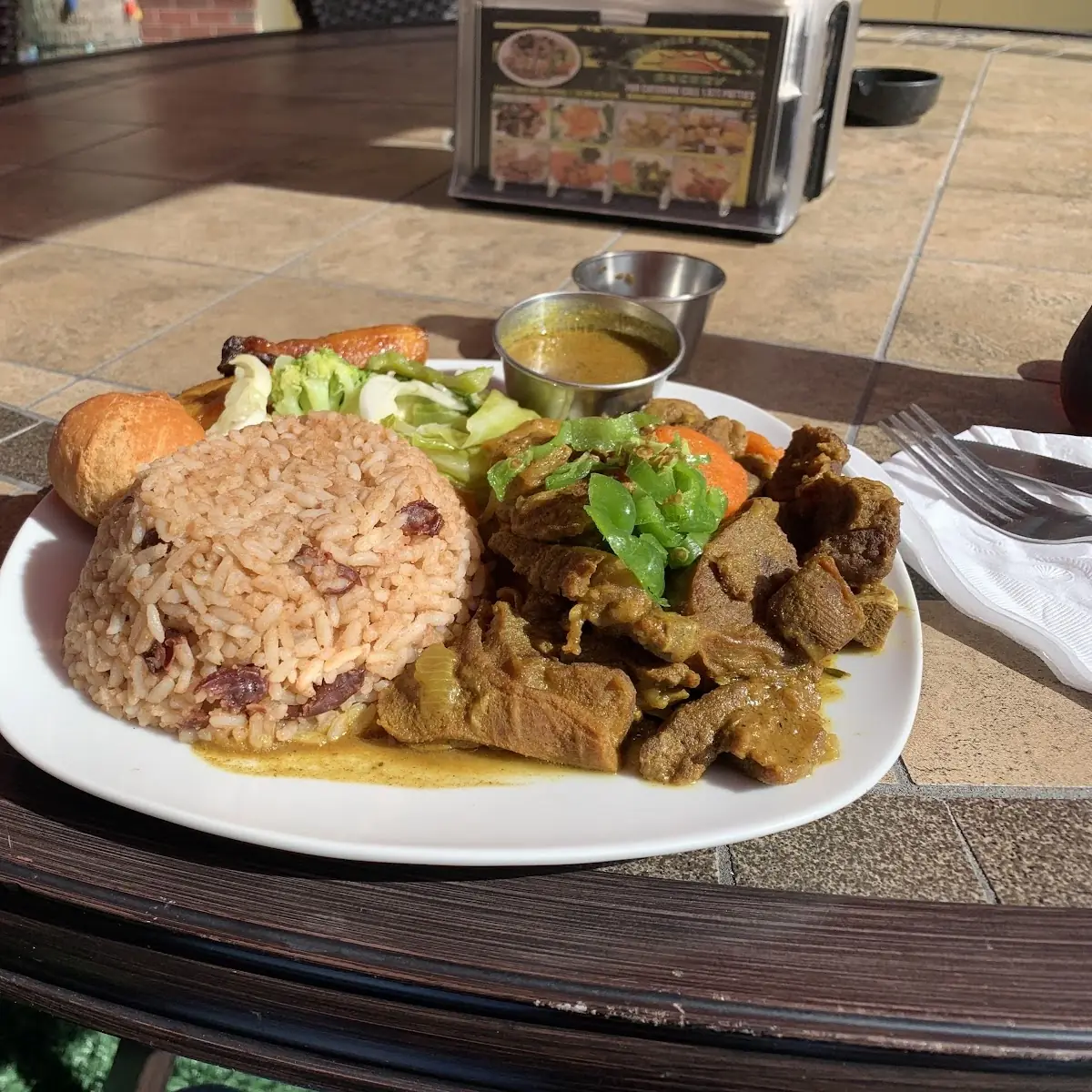 Curry Goat with Rice and Peas