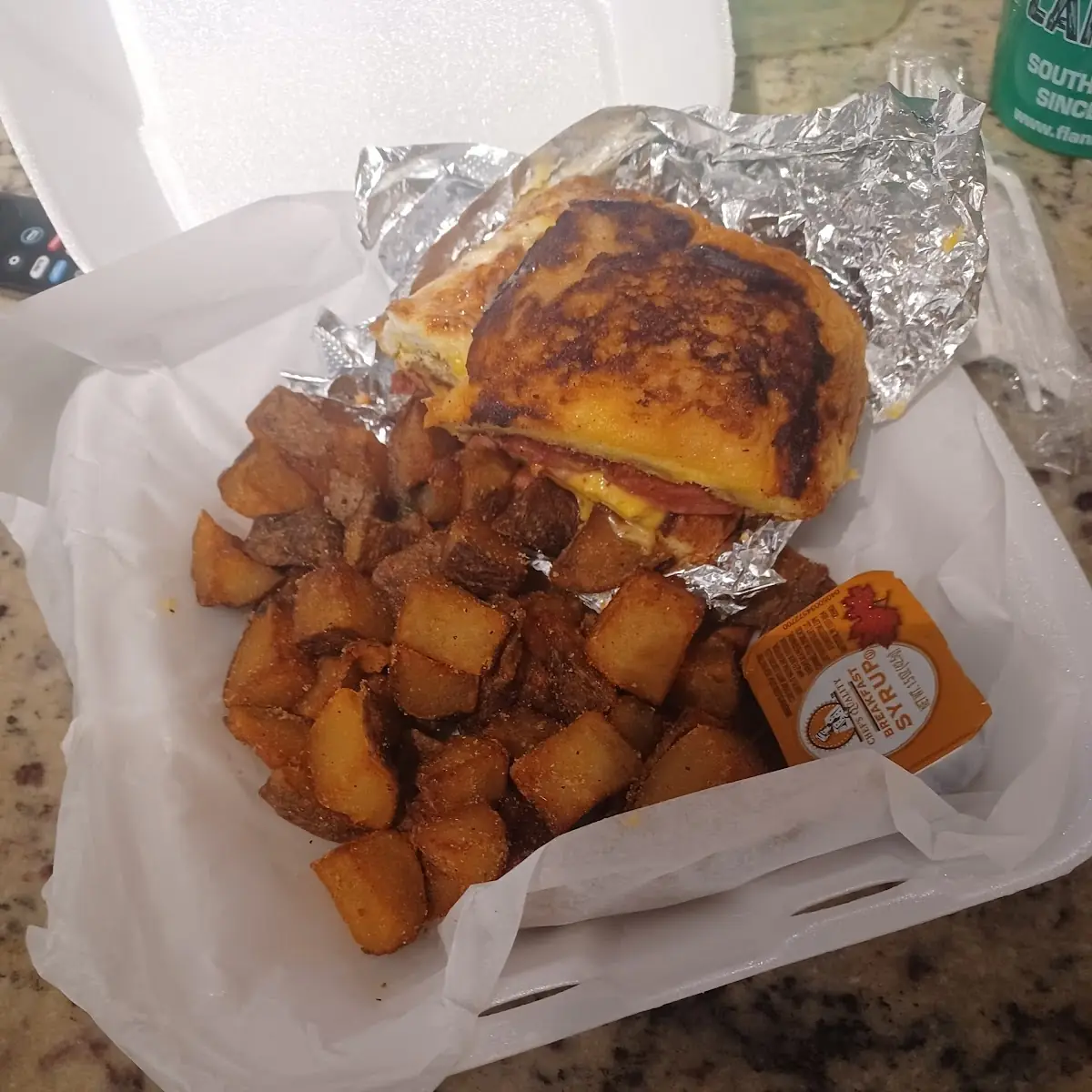 French Toast Breakfast Sandwich with Breakfast Potatoes