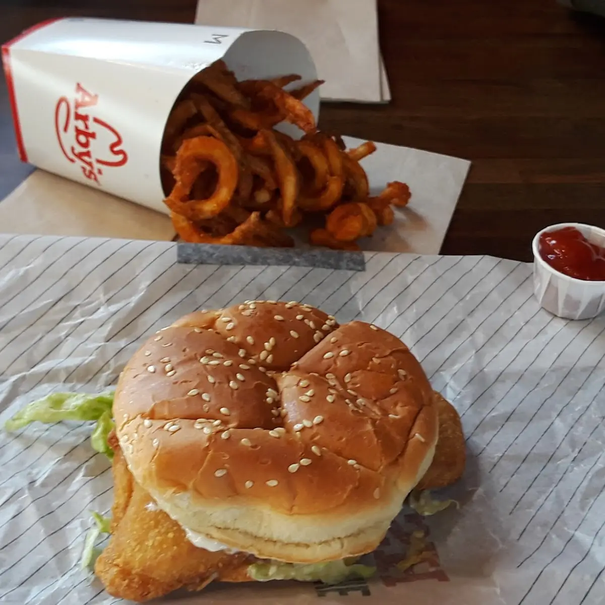 Fish Sandwich and Medium Curly Fries