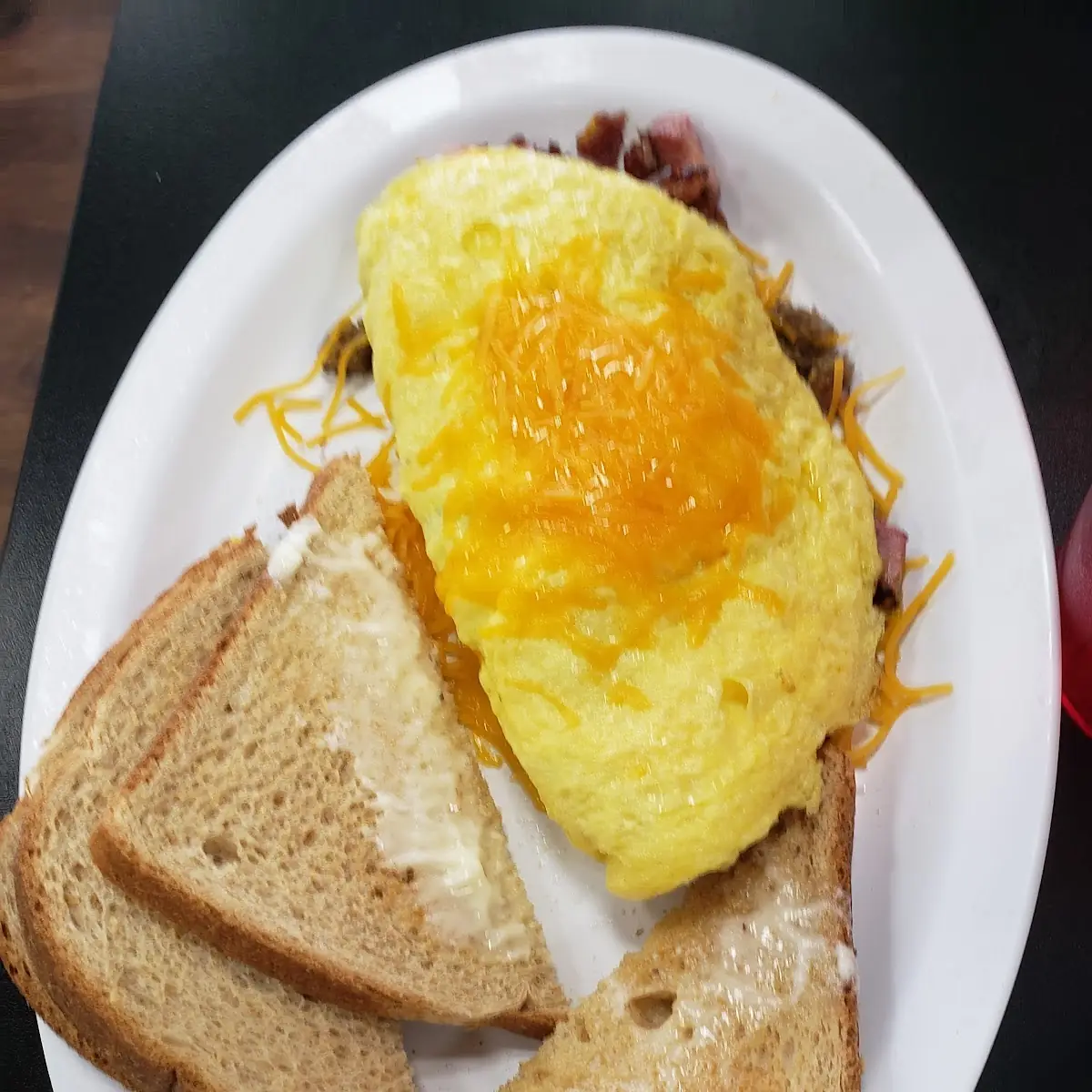 Omlet Ham Bacon Sausage & Cheese
