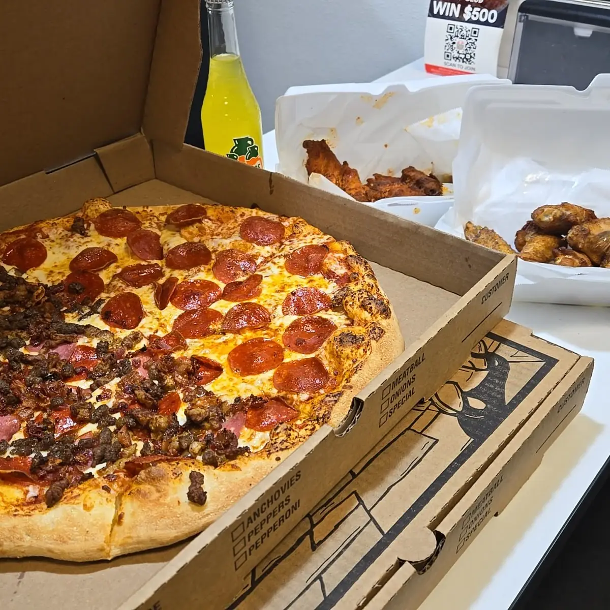 Half Meatlover Half Pepperoni with Lemon Pepper and Hot Buffalo Wings