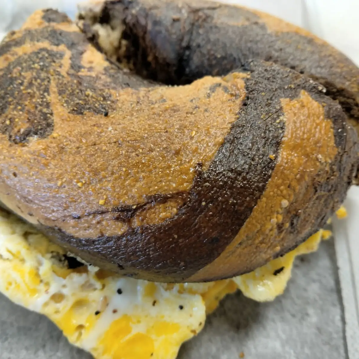 Marble Bagel with Scrambled Egg and Cheese