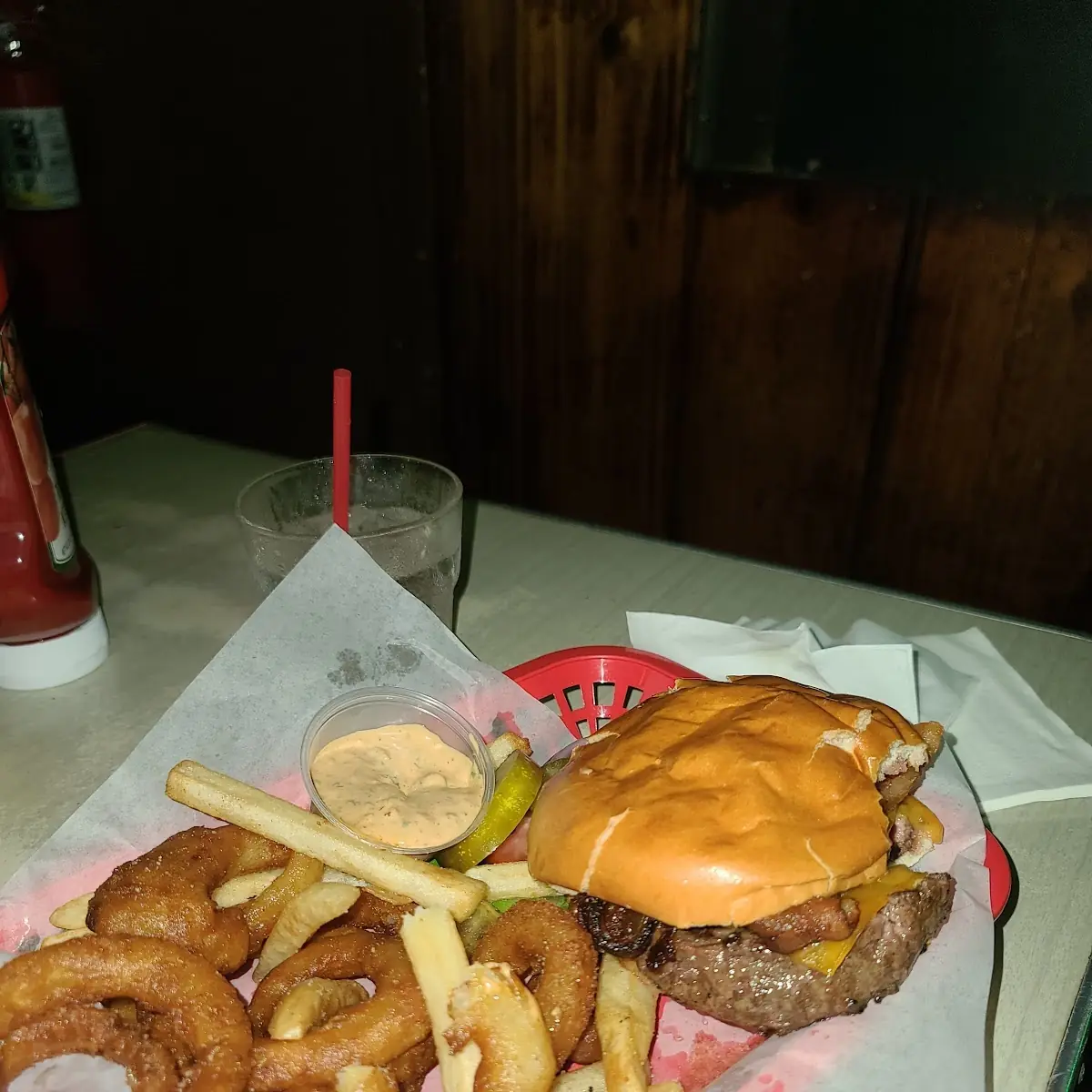 Bacon Cheeseburger with Onion Rings and Heineken