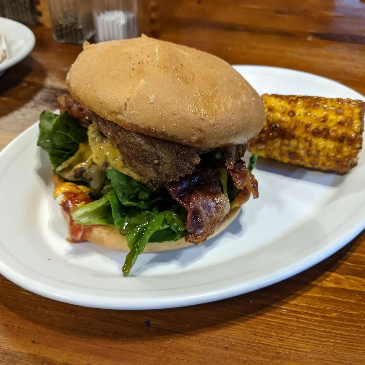 Chef's Special Burger with a Side of Fried Corn