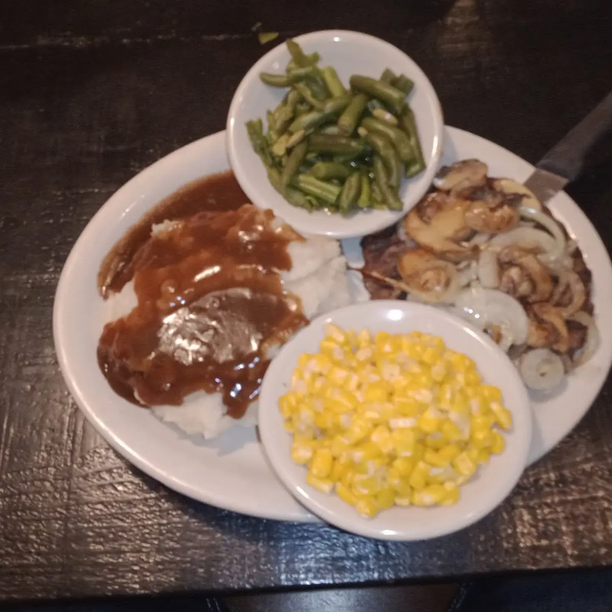Smothered Chopped Sirloin Steak with Mashed Potatoes and Gravy and Corn