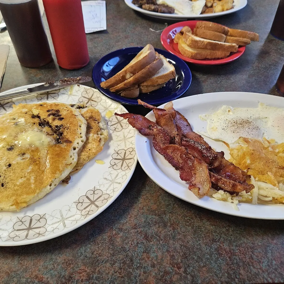 Chocolate Chip Pancakes Eggs Bacon Hashbrowns