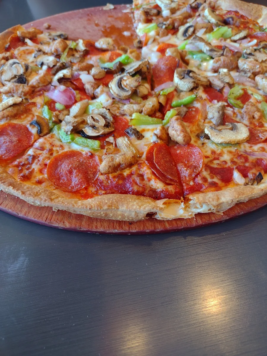 Thin Crust Super Supreme Pizza