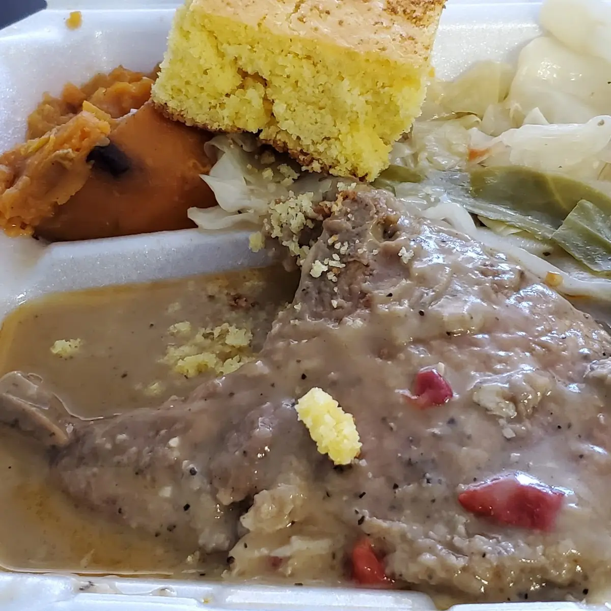 Smothered Pork Chops with Sweet Potatoes and Cabbage