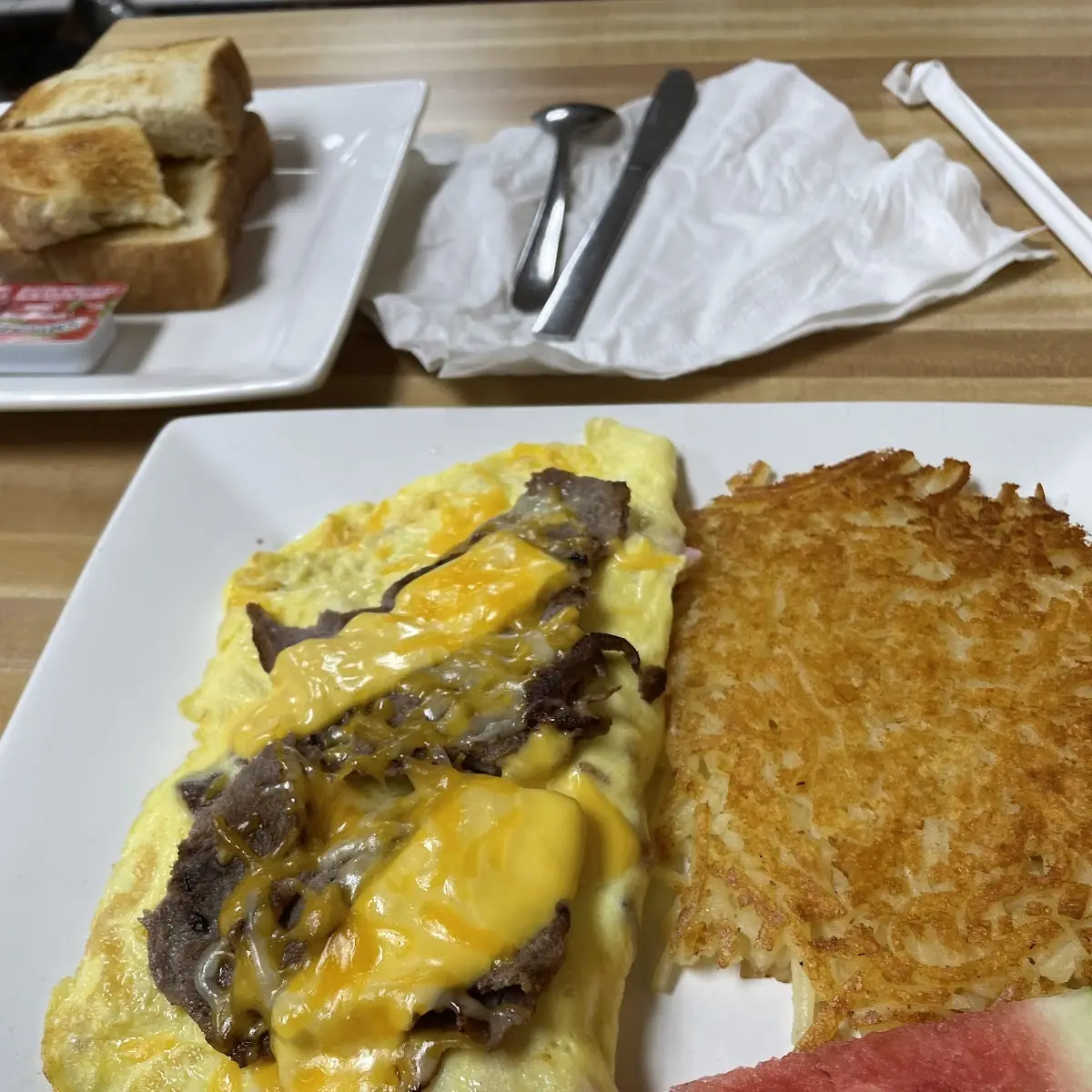 Steak Boom Omelet (Roasted Peppers,onion,mushrooms,shave steak and provolone cheese)