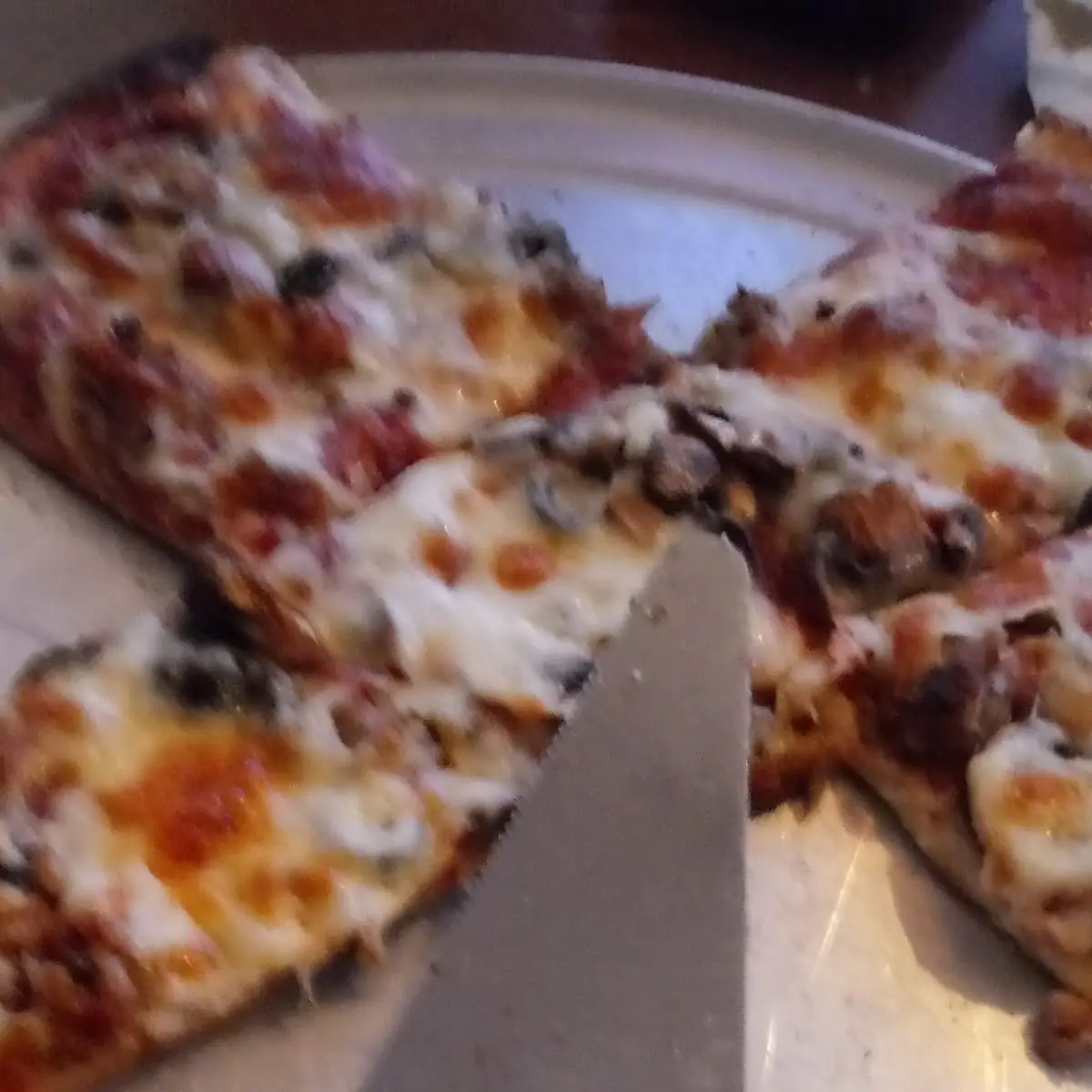 Sausage Mushroom Olive Pizza