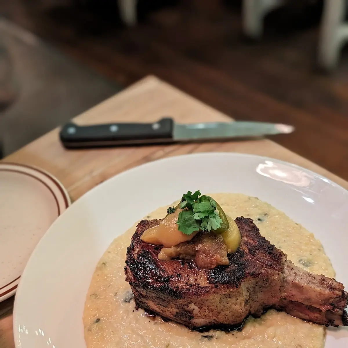 Pork Chop over Poblano Grits