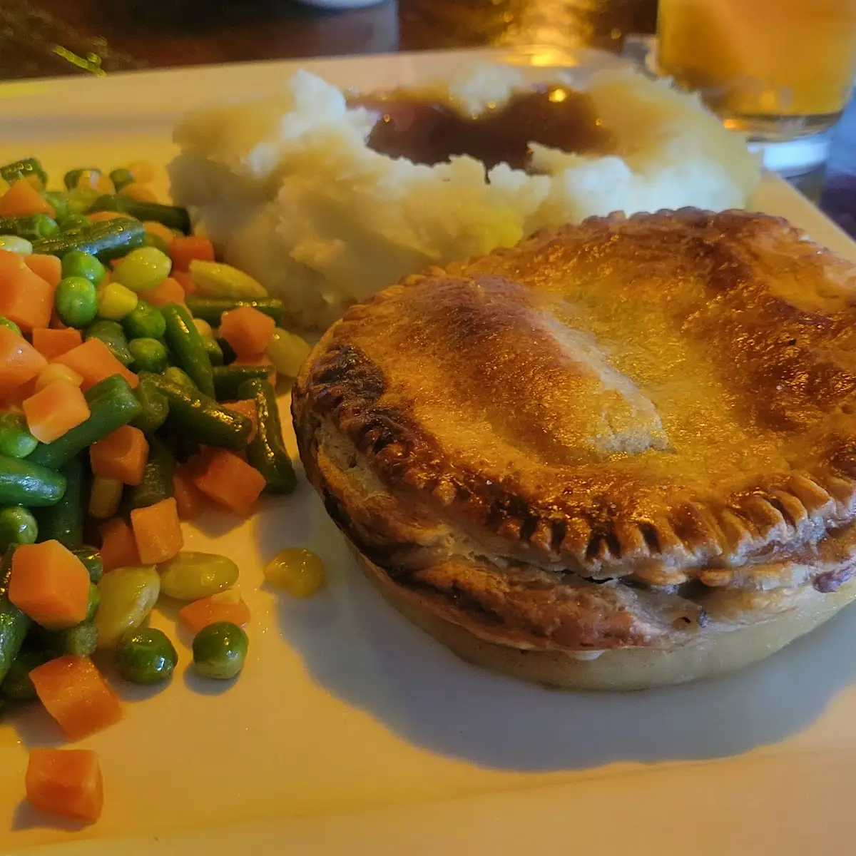 Guinness Steak & Mushroom Pie with Mashed Potatoes & Vegetables
