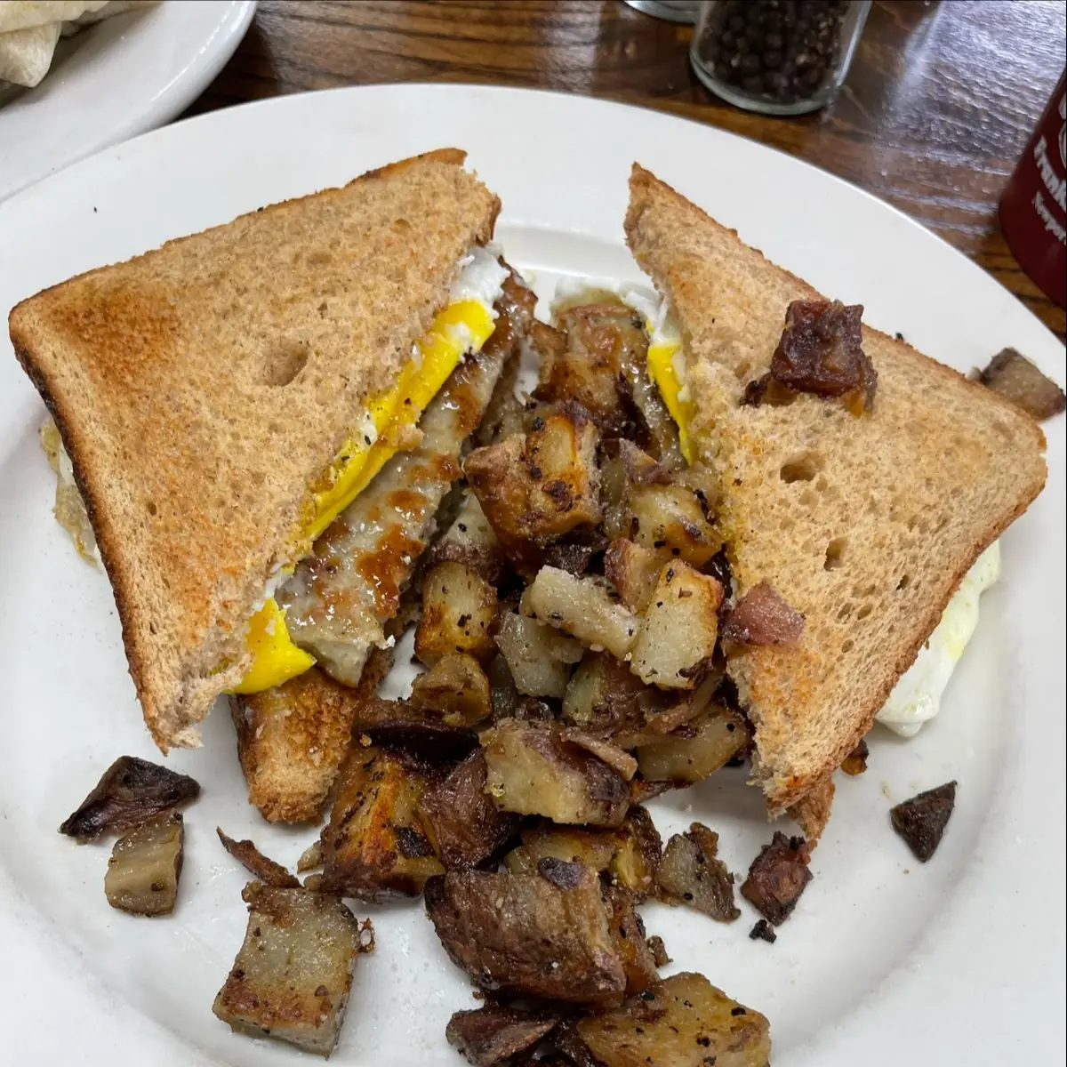 Sausage Egg and Cheese Sandwich with Home Fries