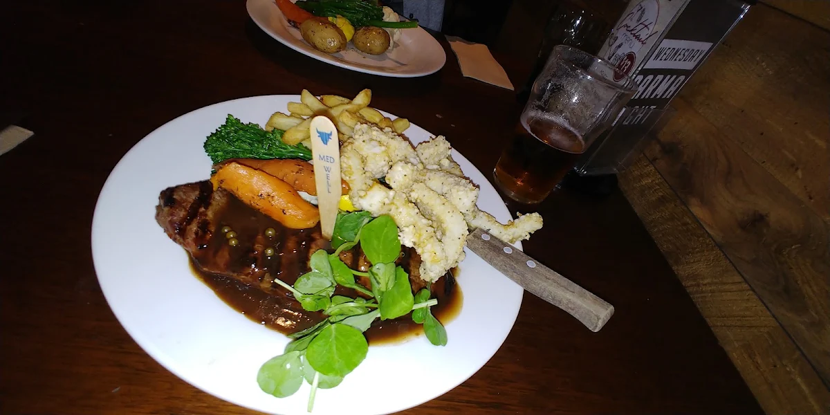 Steak with Vedgies Chips and Calamari, Eltham Hotel