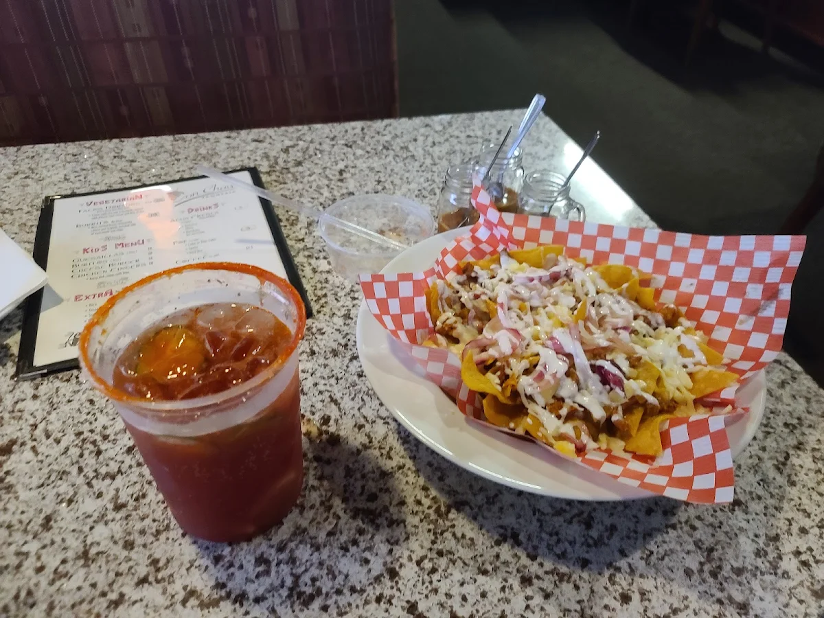 Michelada with Cucumber and Shrimp and Nachos Loco