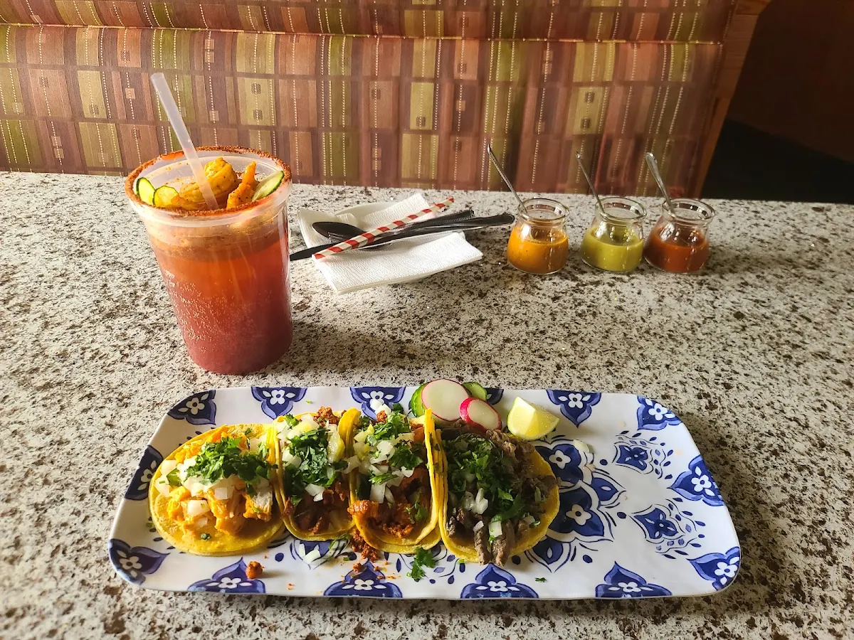 Michelada with Shrimp and Cucumber 2 Tacos Al Pastor One Chicken and One Carnitas