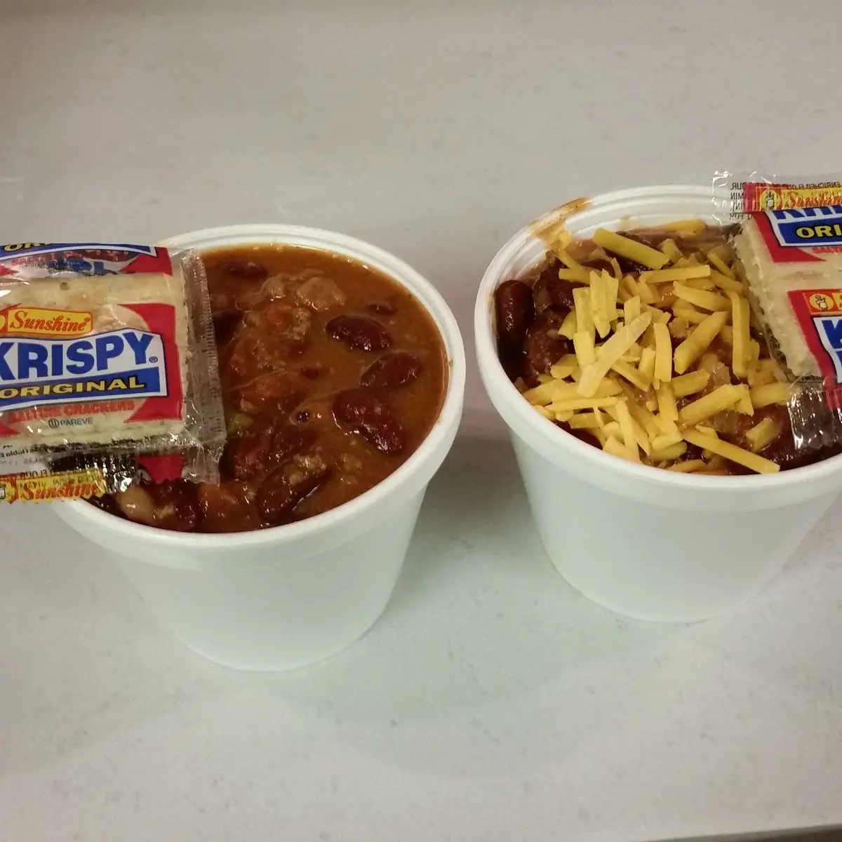 Sweet Chili with and Without Cheddar Cheese on Top