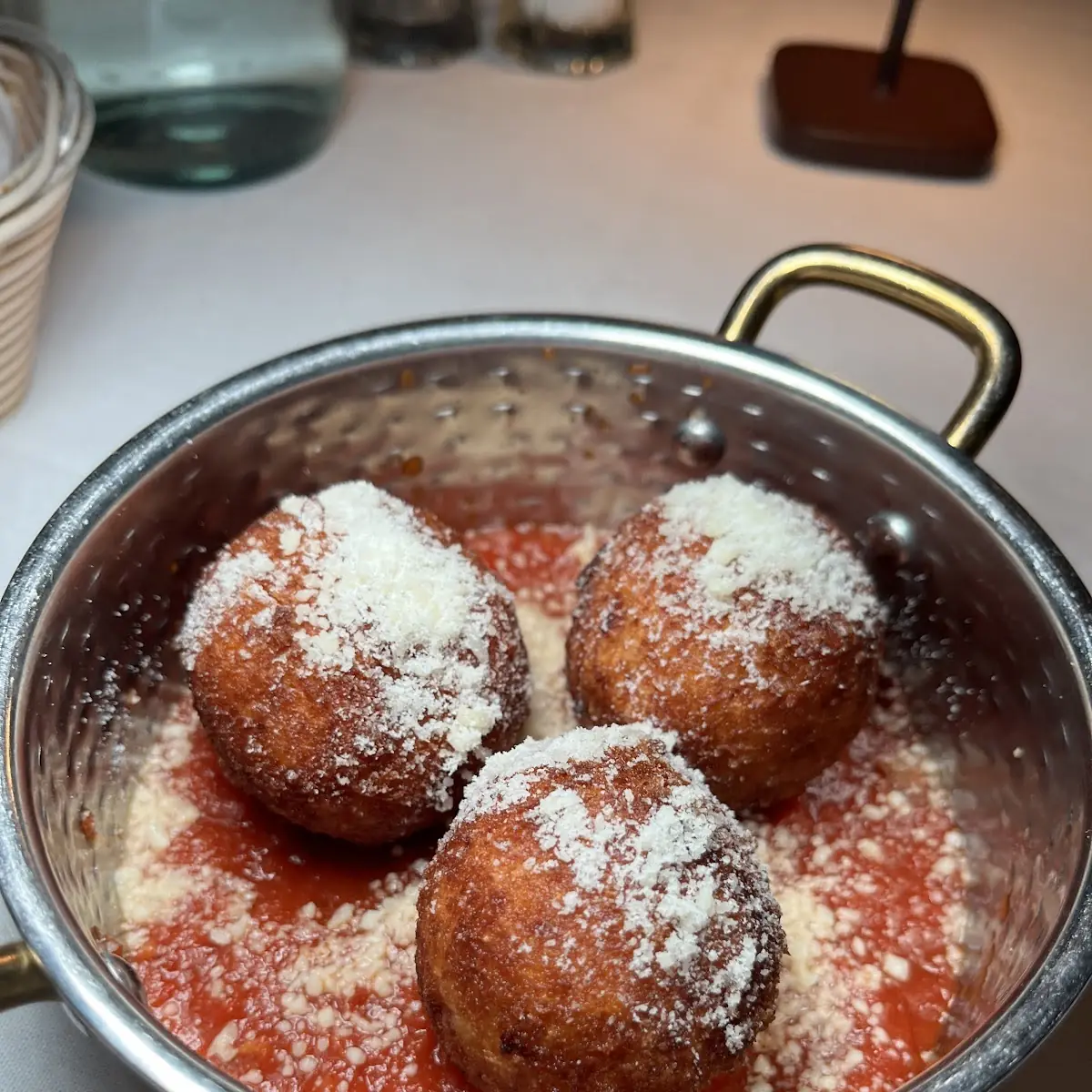 Fried Arancini in Tomato Sauce