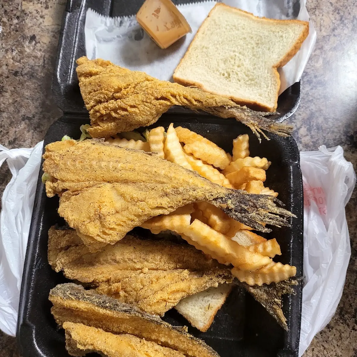 Catfish Filet Crinkle Cut Fries and Bread