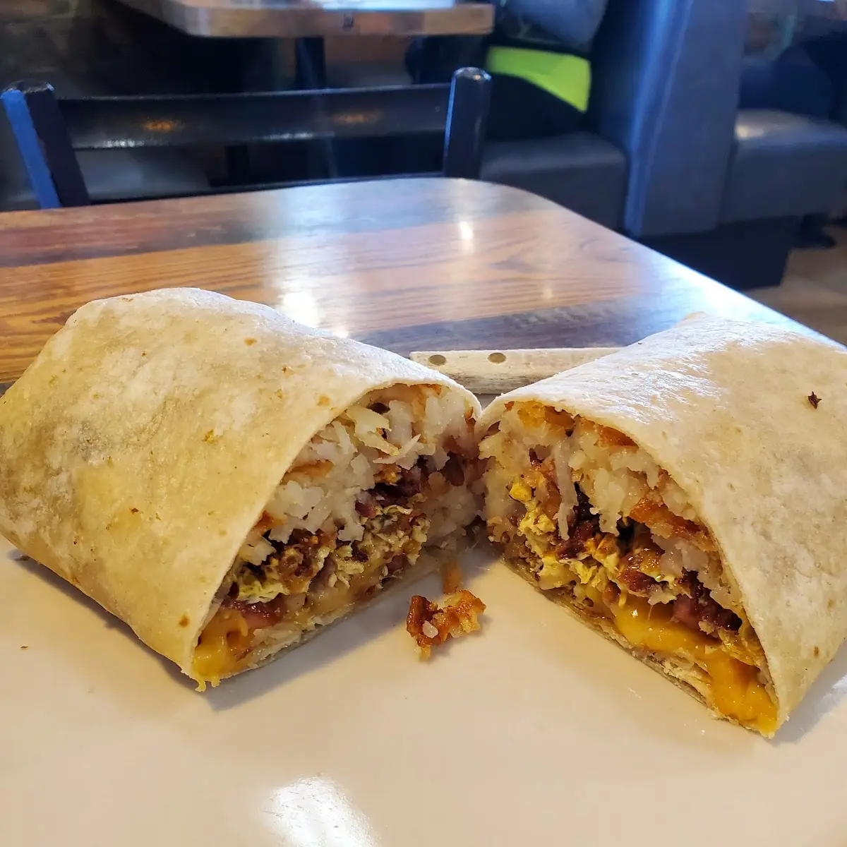 Meat Lover Burrito with Ham Bacon Sausage Two Eggs Hash Browns & Cheese