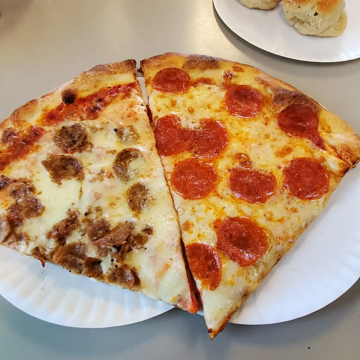 Sausage and Pepperoni Pizza Slice