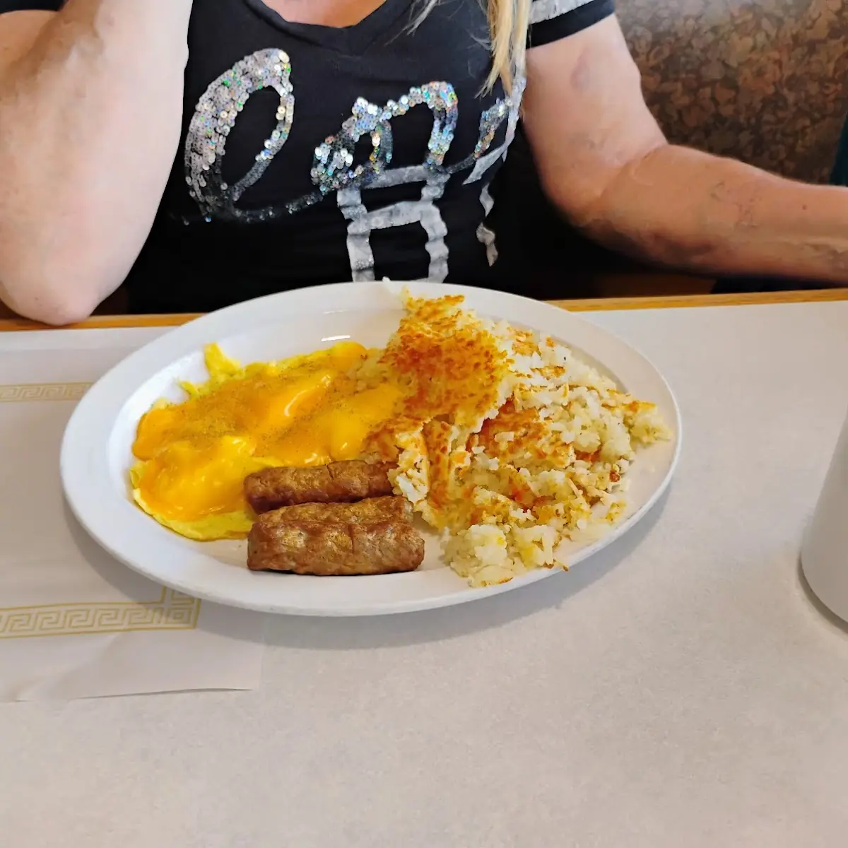 Cinnamon French Toast with Eggs Bacon Sausage