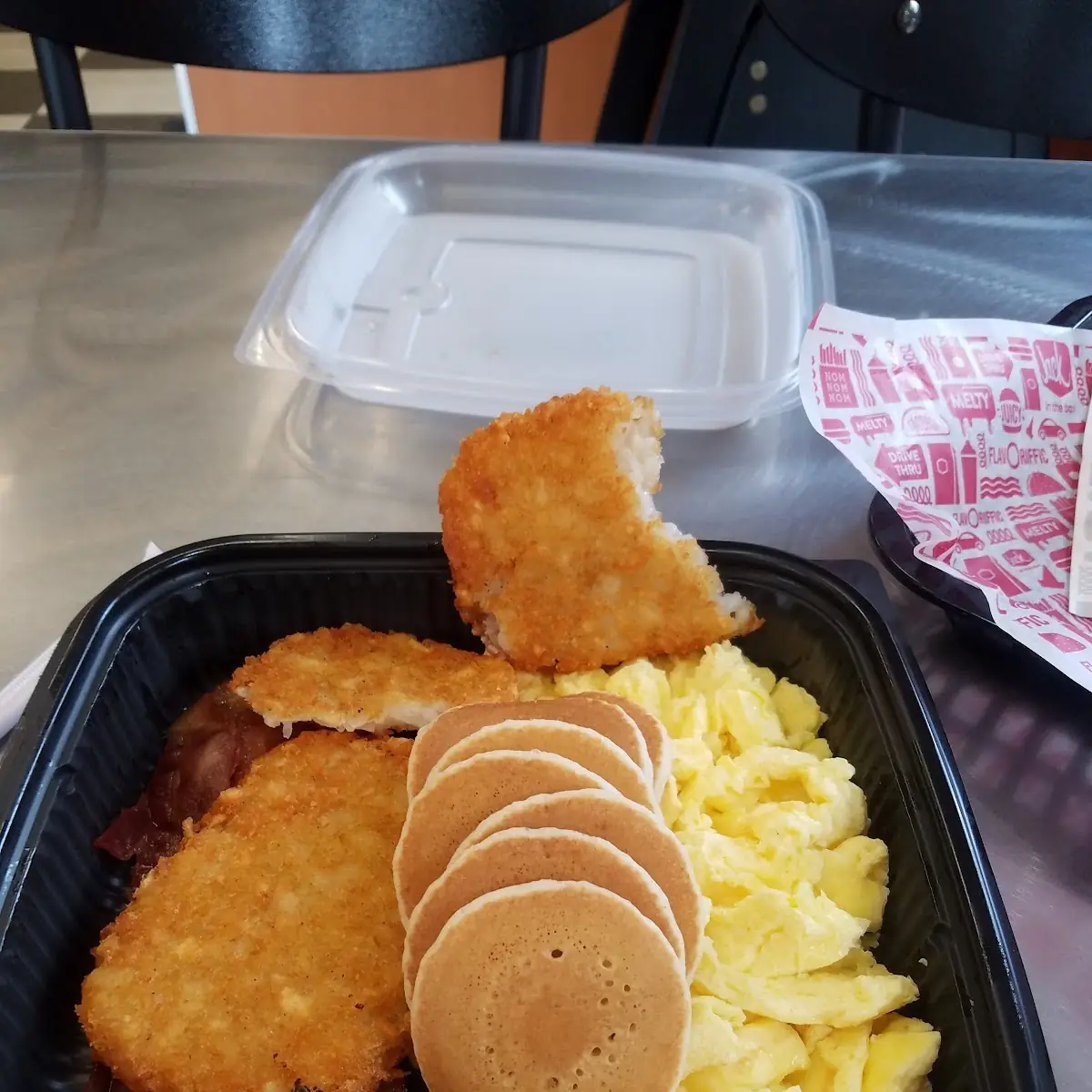 Hot Cakes Eggs Bacon and Hash Browns