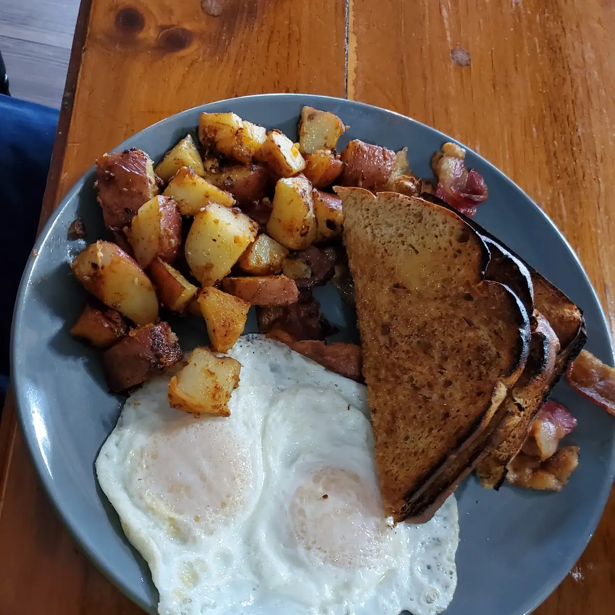 2 Eggs Wheat Toast Hash Browns and Bacon