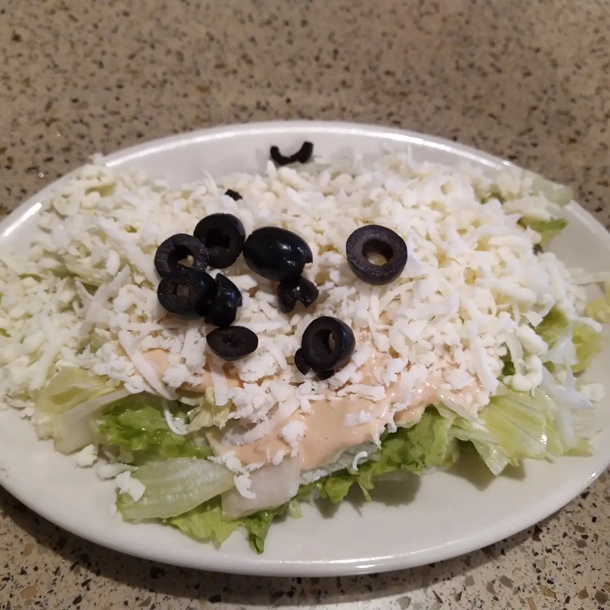 House Salad Includes Mozzarella Cheese and Black Olives