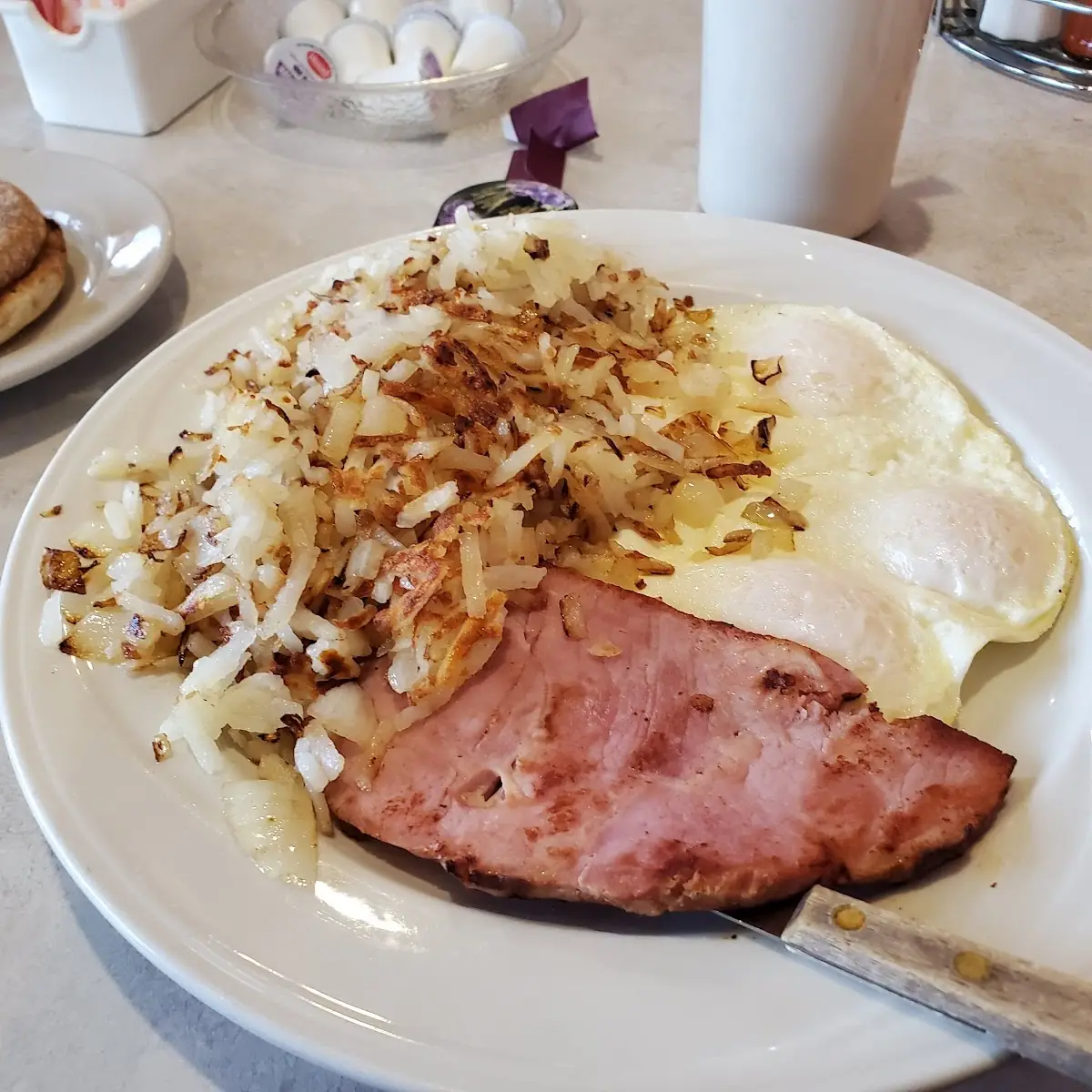 Eggs over Easy with Ham Hash Browns with Grilled Onions
