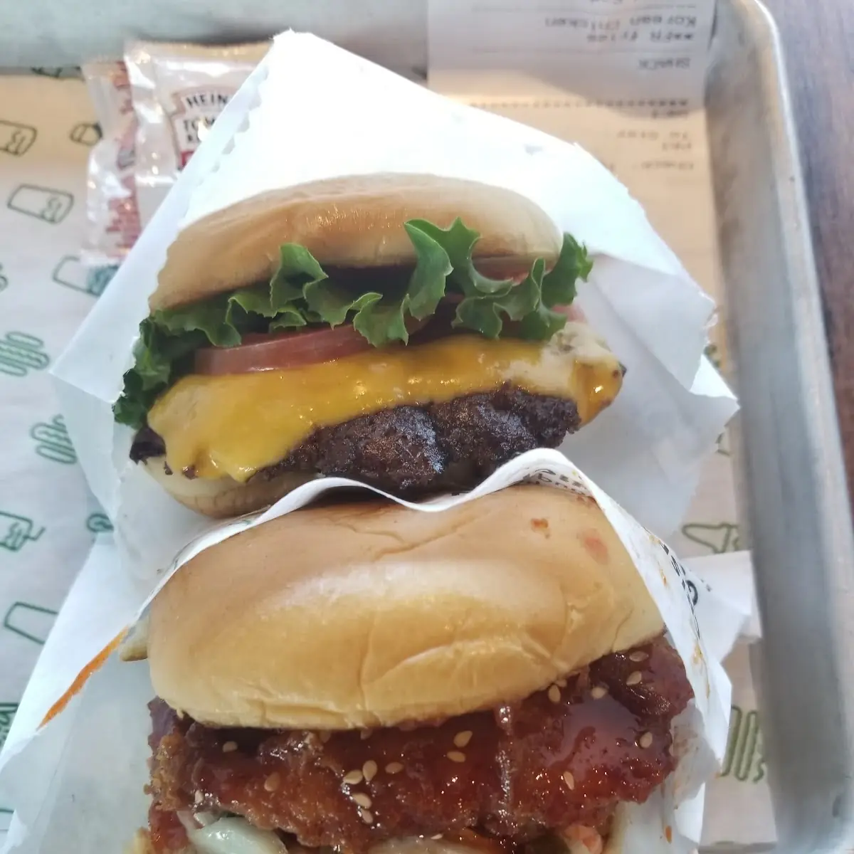 A Regular Hamburger and a Korean Chicken Sandwich