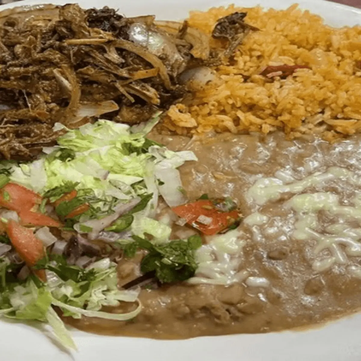 One Beef Taco, Rice and Fried Beans