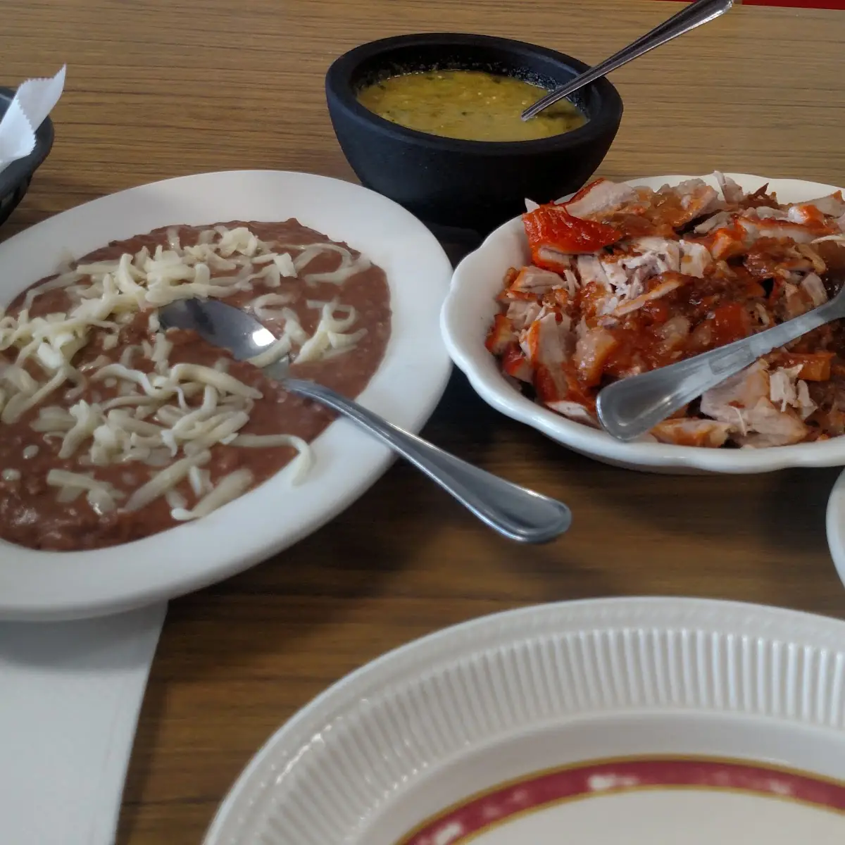 Mixed Carnitas Plate with Refried Beans