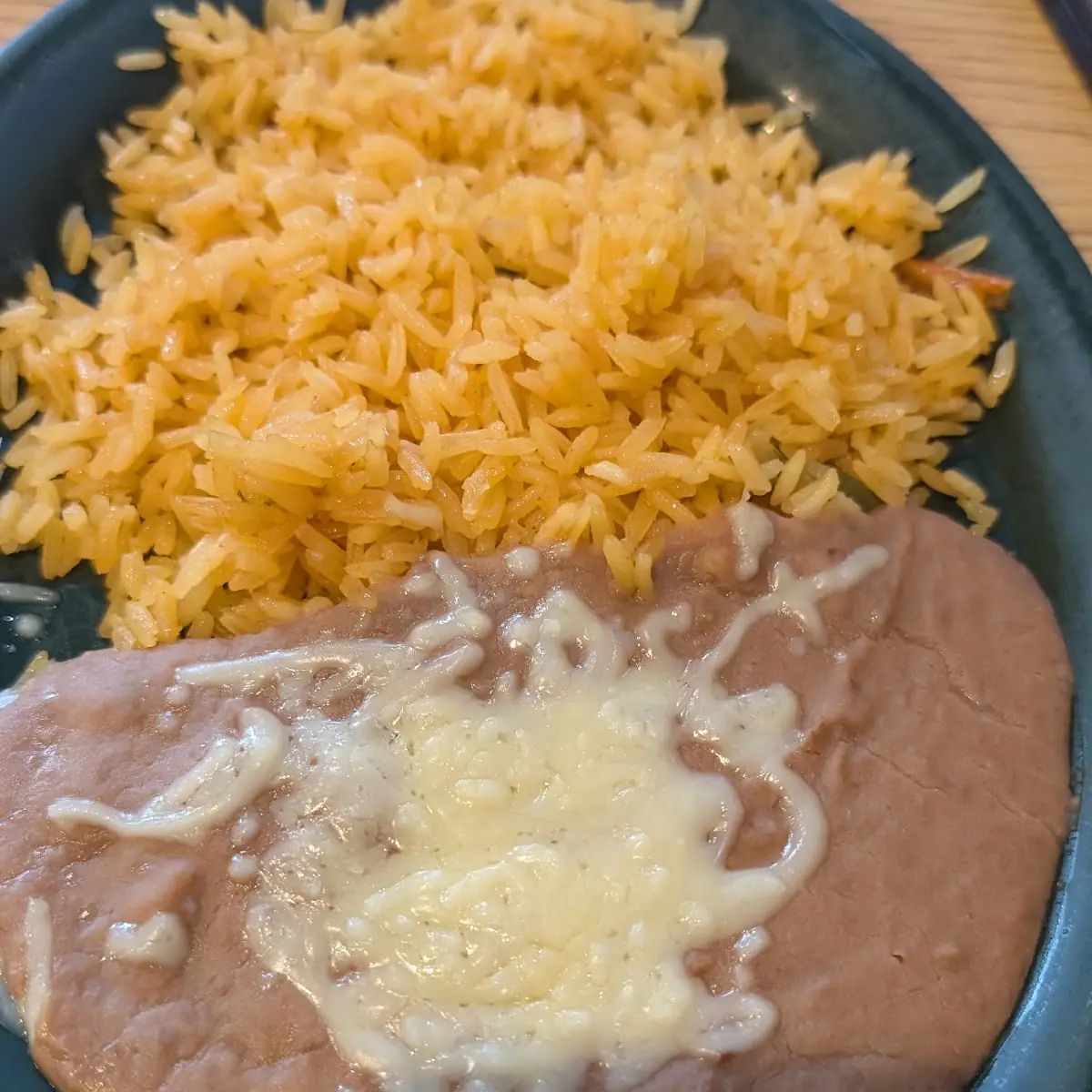 6. Two Cheese Enchilada, Rice & Beans