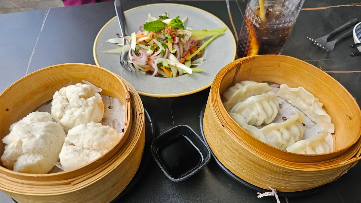 Steamed Pork Buns Octopus Salad and Dumplings, Food World Asian Fusion