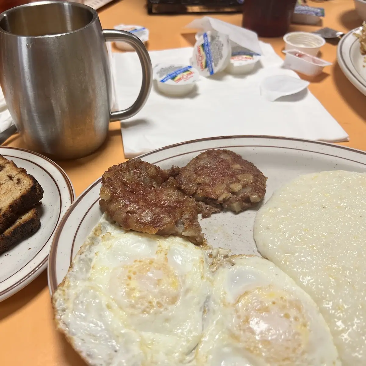 Eggs Grits and Corned Beef Hash