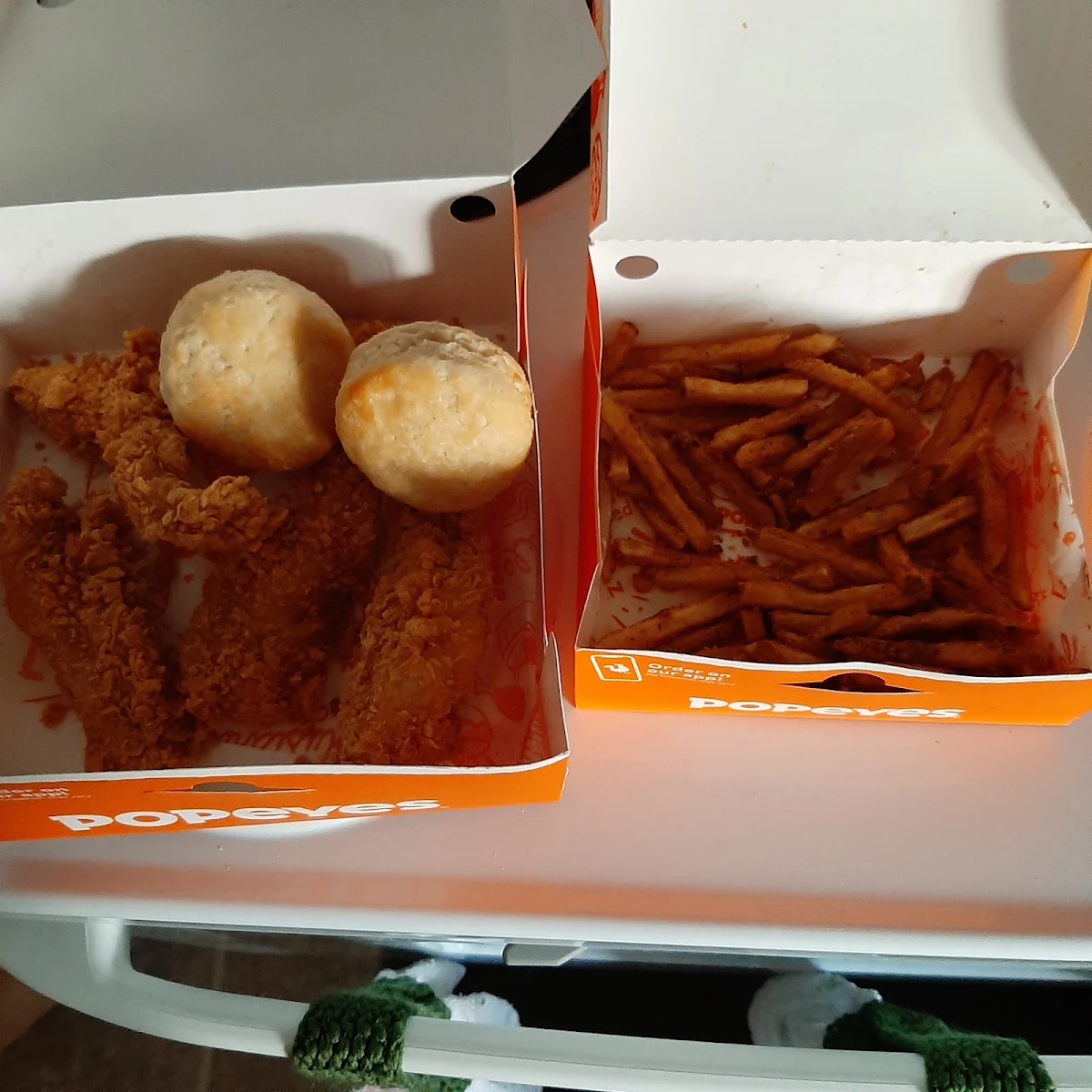 Chicken Strips Cajun Fries and Biscuits