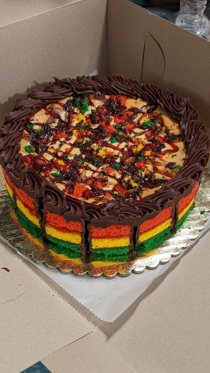 Rainbow Cookie Cheesecake