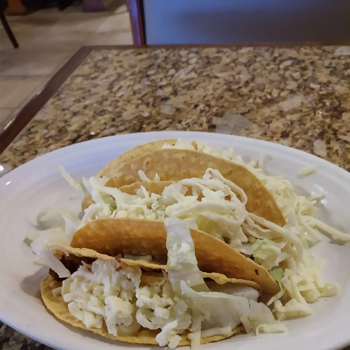 Beef Taco and 2 Shredded Chicken Tacos