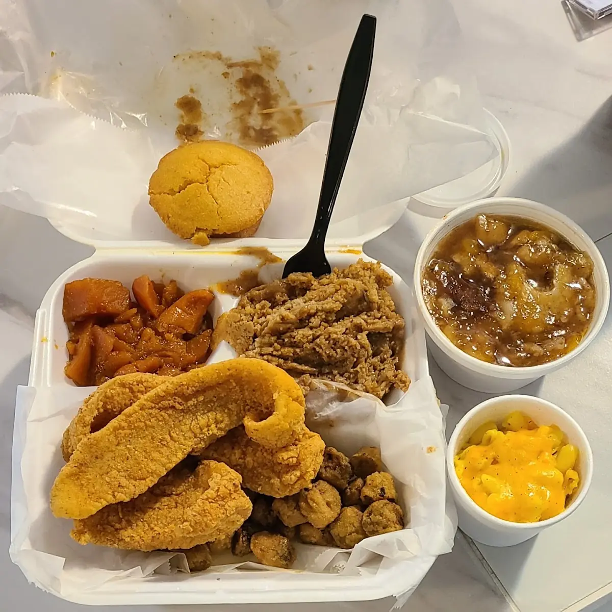 Fried Catfish Okra Cornbread Dressing Yams Mac & Cheese Cornbread Muffin & Peach Cobbler